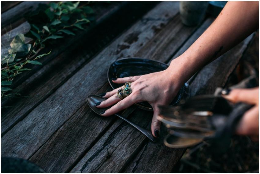 From above of crop anonymous female in rings putti
