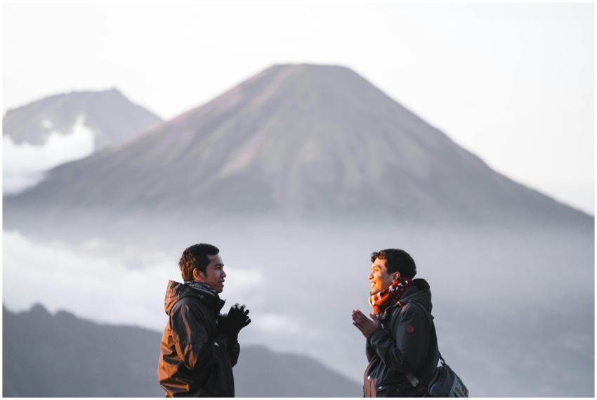 Two men enjoy a scenic hike on Indonesia's Gunung