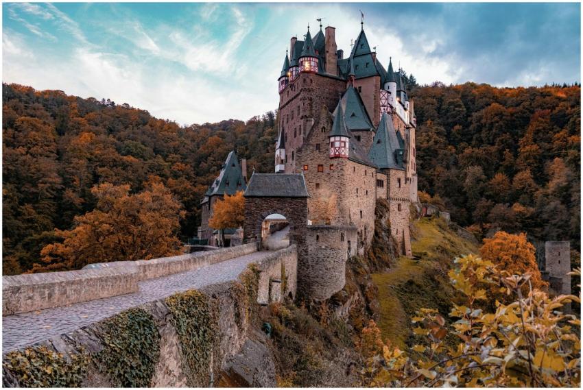 Explore the enchanting Eltz Castle amidst vibrant