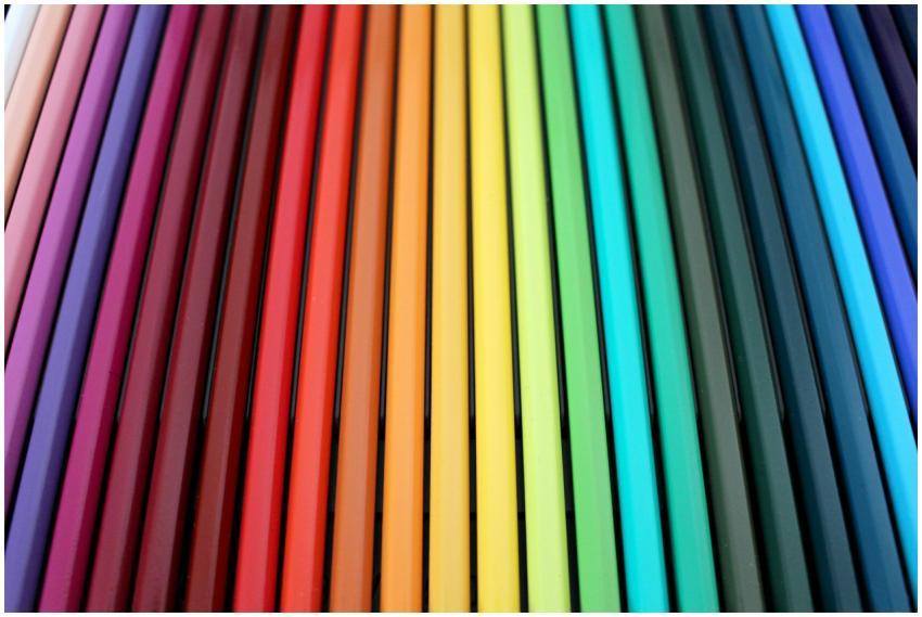 A vibrant and colorful arrangement of colored penc