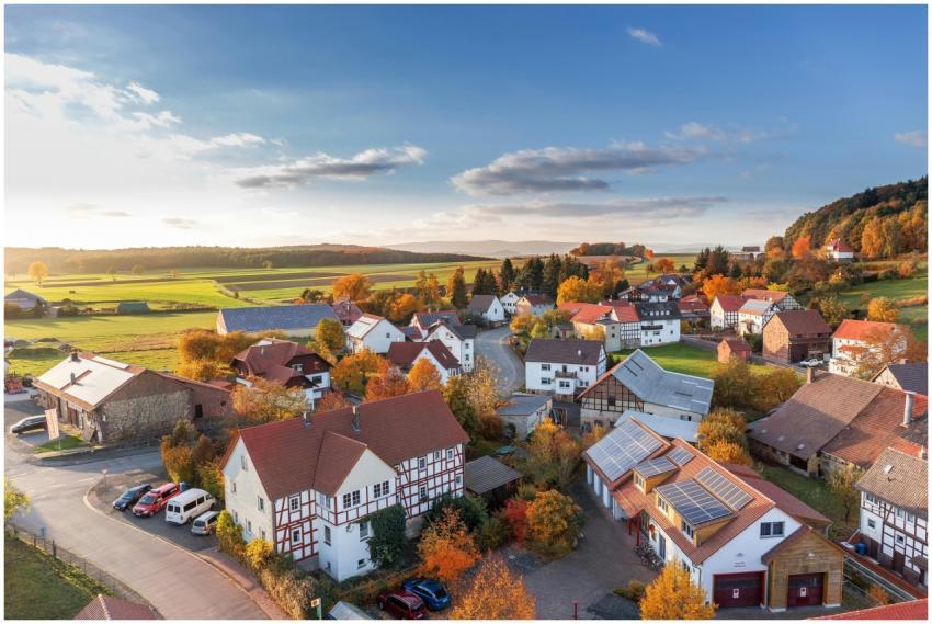 Charming aerial view of a rural village in autumn