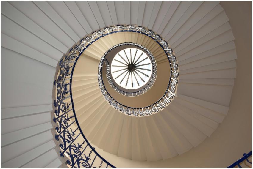 A captivating view up a spiral staircase with intr