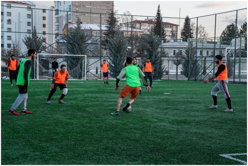 Casual soccer game on an outdoor field in İstanbul