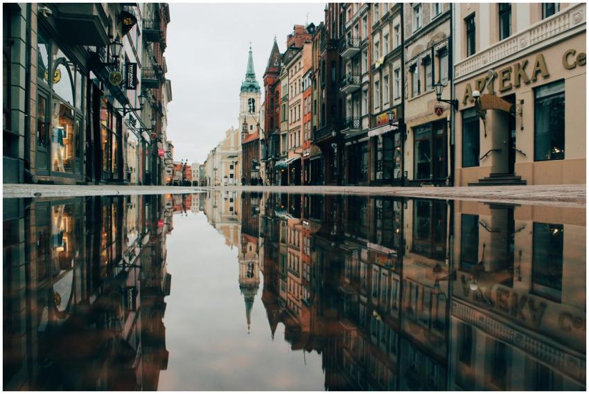 A tranquil street in Toruń, Poland, with historic