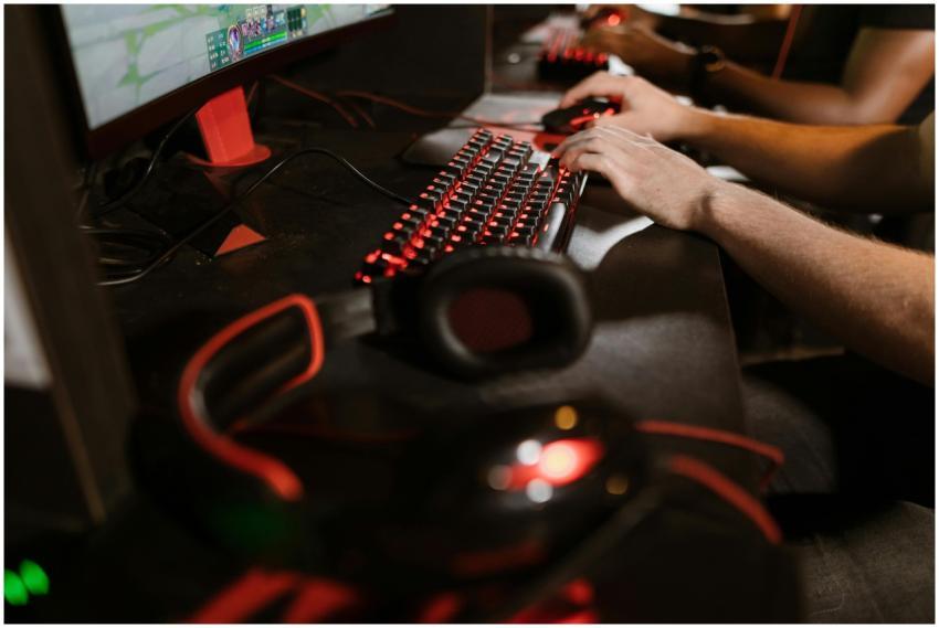 Close-up of gamers using mechanical keyboards duri