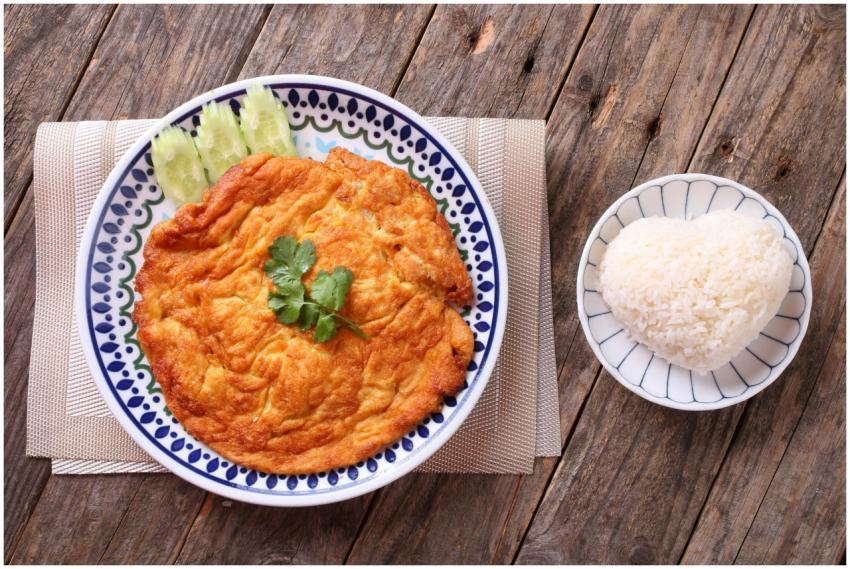 Delicious Thai-style omelette served with heart-sh