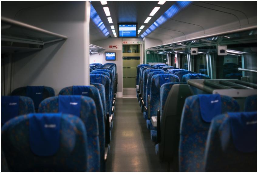 A serene scene of a modern train's interior with e