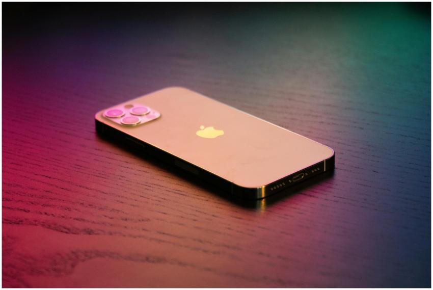 Close-up of a modern smartphone on a gradient-lit