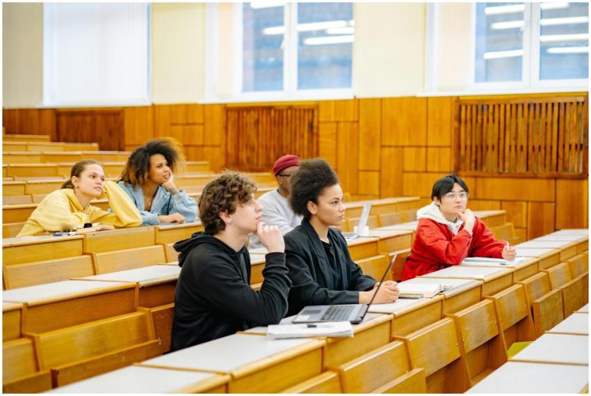 Students of various backgrounds attentively listen
