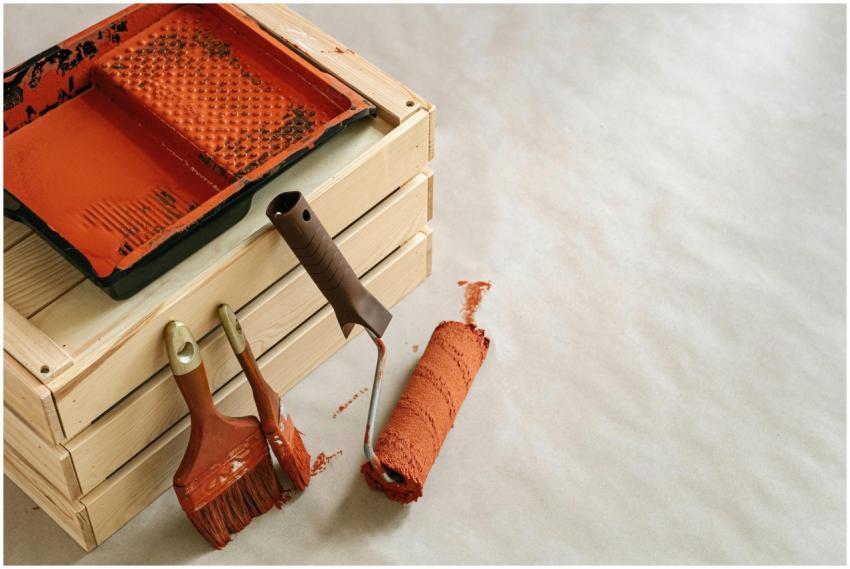 A collection of painting tools and supplies for ho