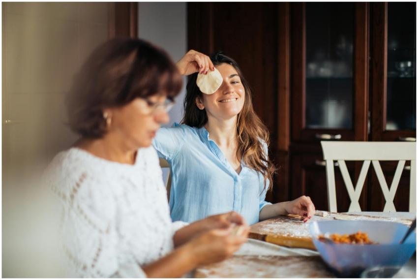 Mother and daughter bonding over making pelmeni in