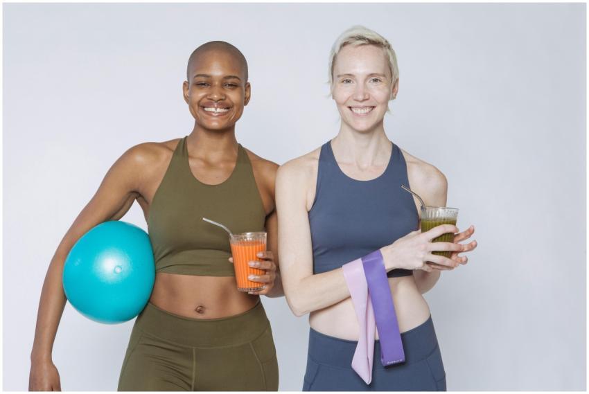 Positive multiracial sportive women in sportswear