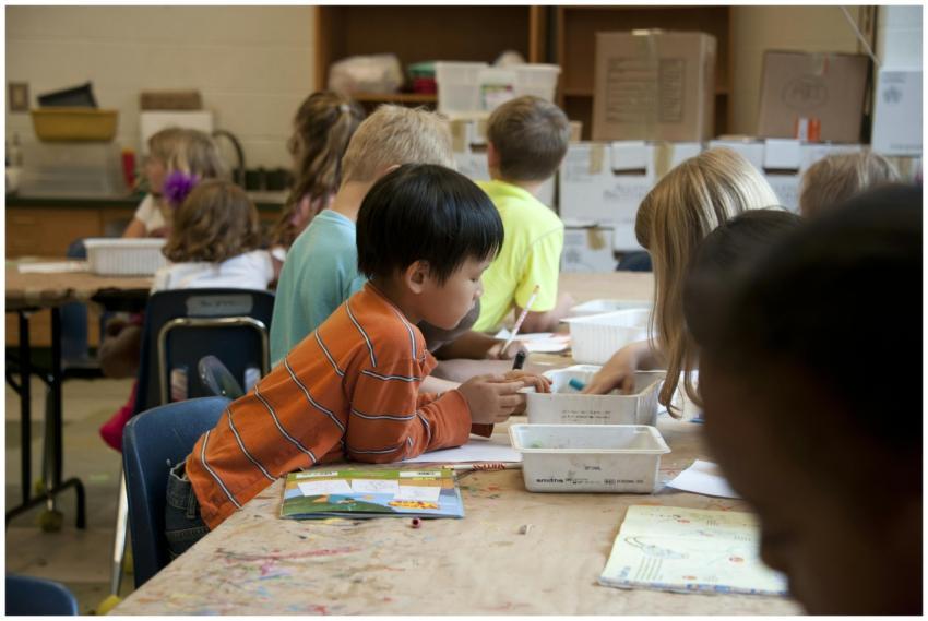 Children creating art projects in an engaging clas