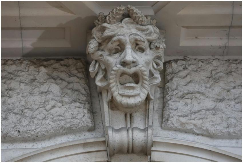 Close-up of a dramatic stone sculpture on a Vienna