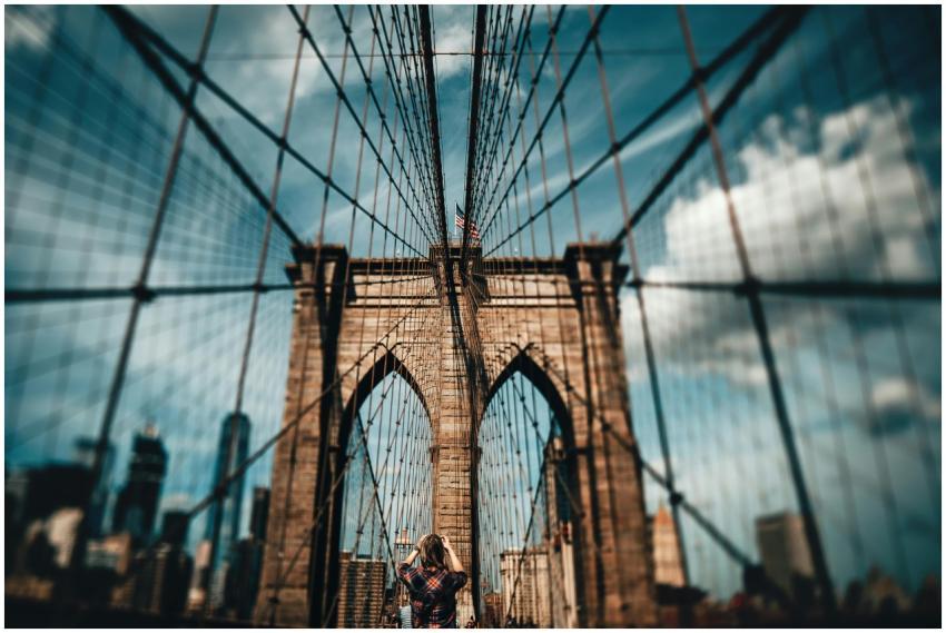 A photographer captures the iconic Brooklyn Bridge