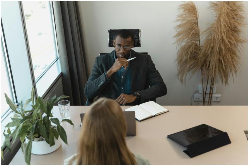 Professional office meeting with diverse team disc