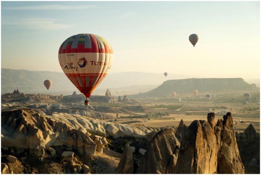 Breathtaking aerial view of hot air balloons float
