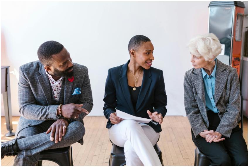 A diverse group of professionals discussing busine