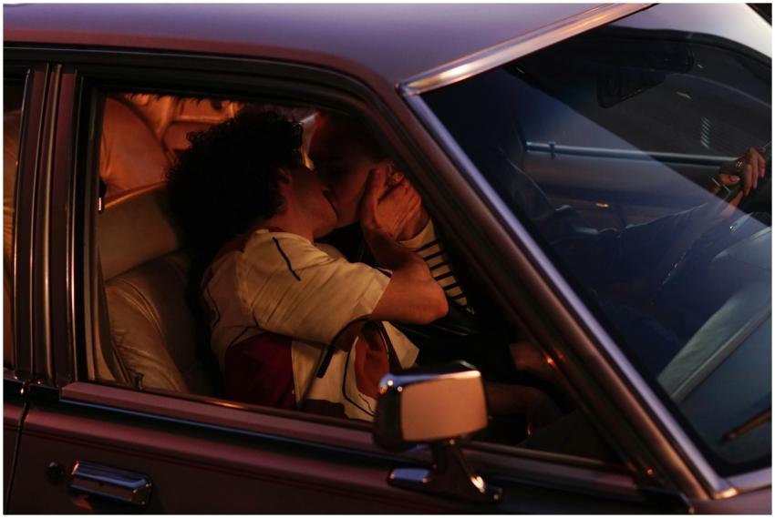 Close-up of a couple sharing a romantic kiss insid