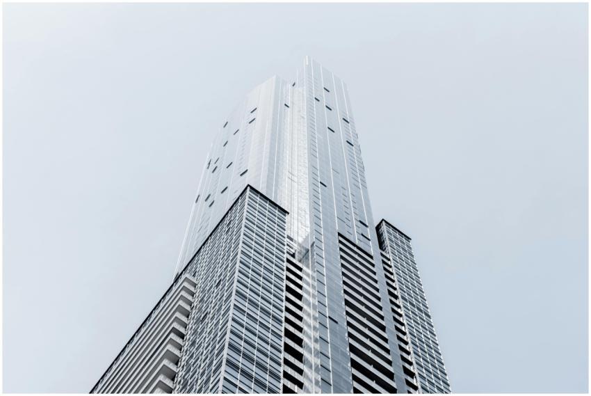 A striking modern skyscraper with a geometric glas