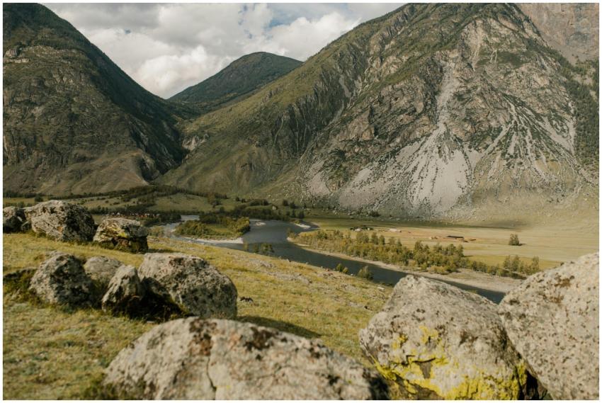 A picturesque mountain valley featuring a winding