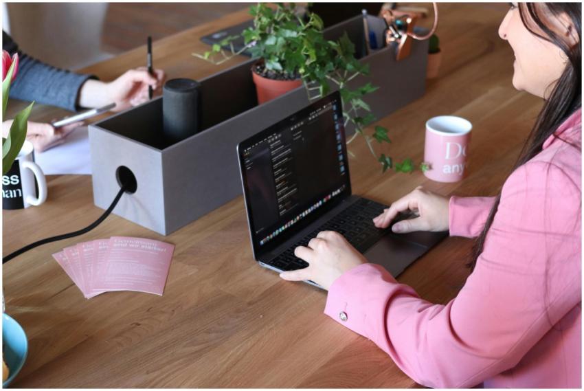 Two women collaborating in a modern office setting