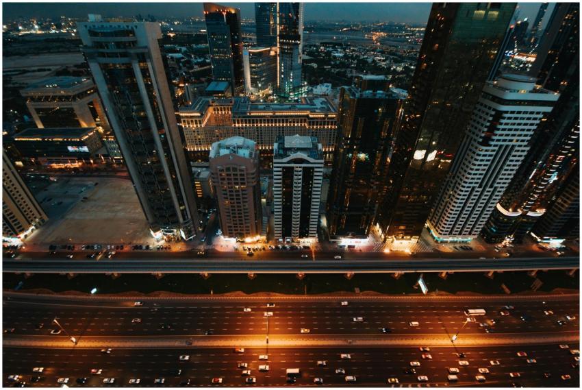 A vibrant urban skyline with illuminated skyscrape