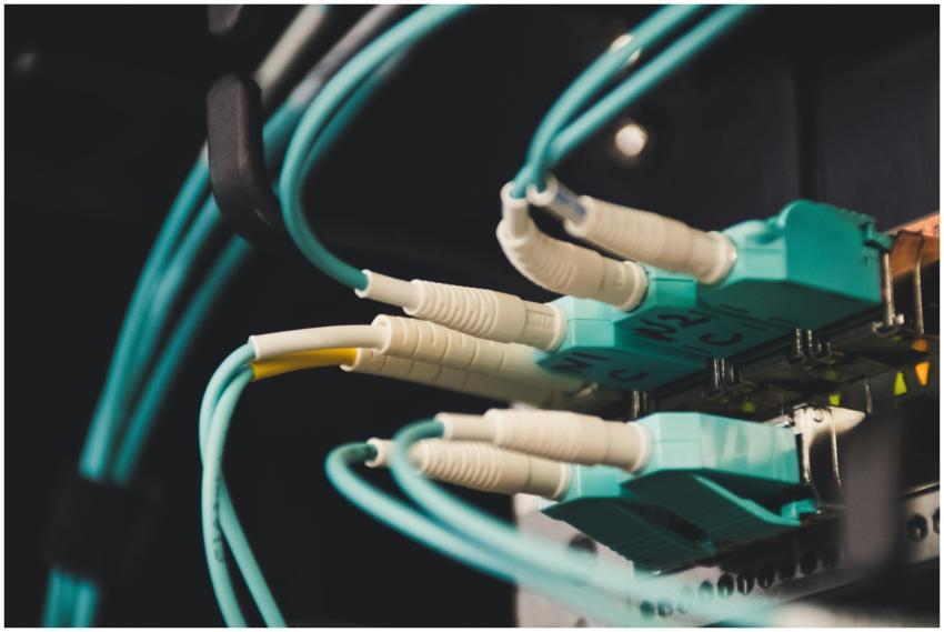 Detailed view of fiber optic cables and ports in a