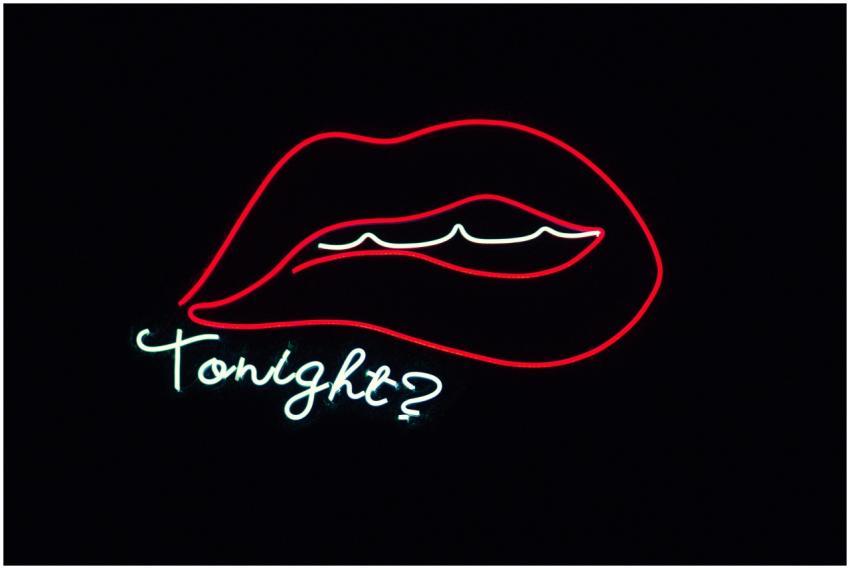 Creative neon sign featuring lips and 'Tonight?' o
