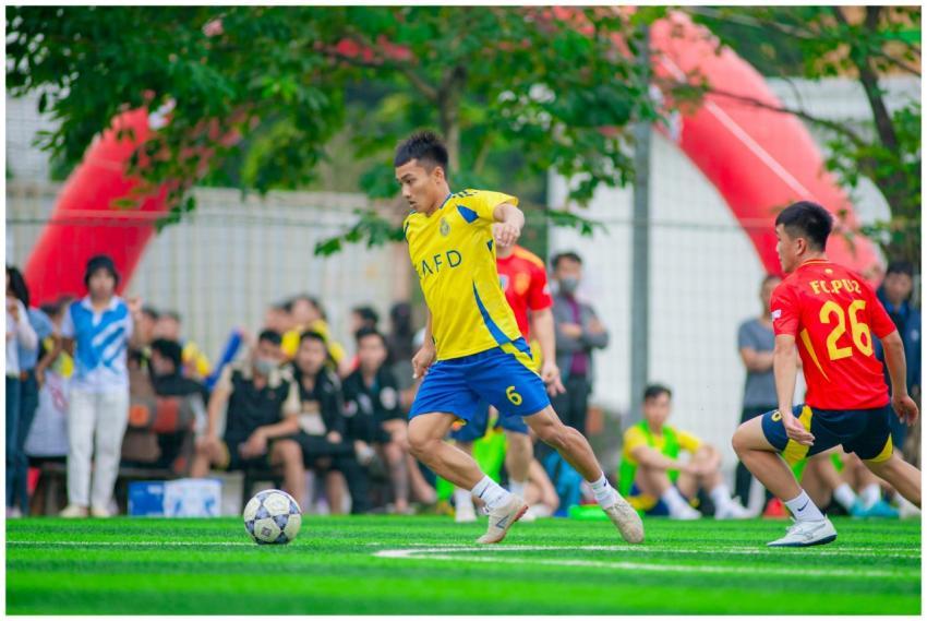 A dynamic soccer game captured in Hanoi, showcasin