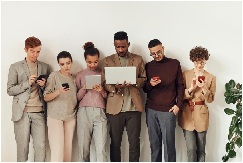 A diverse group of adults interacting with various