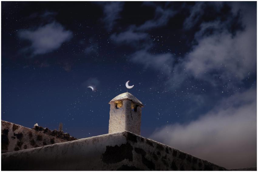 Lanzarote's traditional chimney silhouetted agains