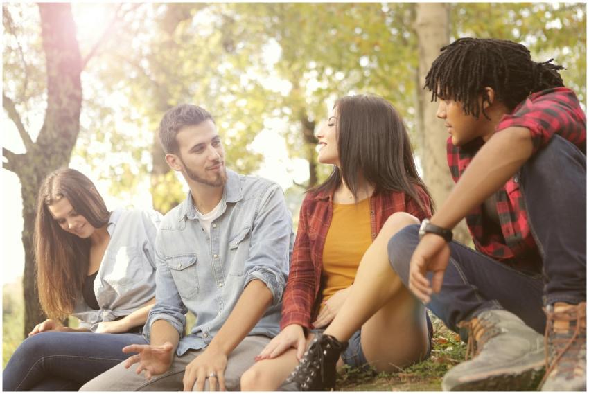 From below of diverse young people in casual cloth