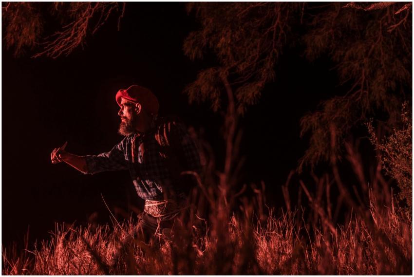 Portrait of an Argentine gaucho at night, illumina