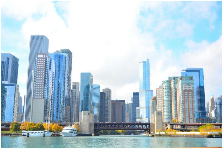 Bright daytime view of Chicago skyline and river,