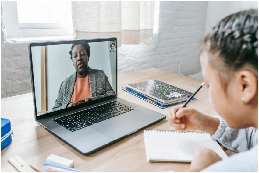 Back view of crop anonymous focused ethnic girl ha