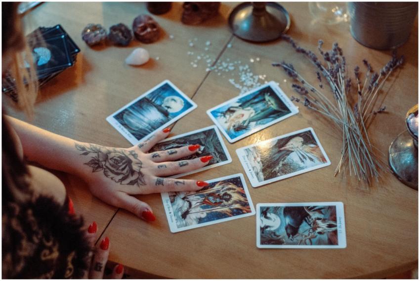 A mystical setup featuring tarot card reading on a