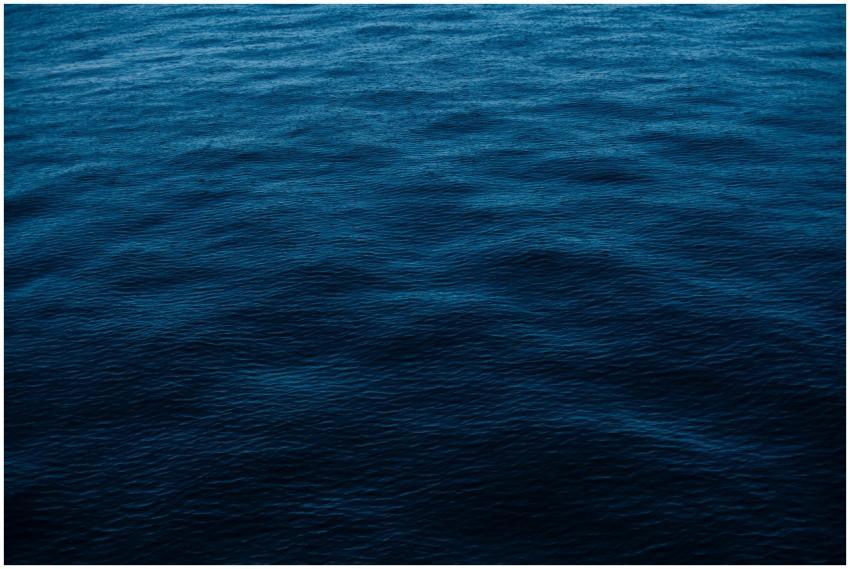 Vivid depiction of deep blue ocean surface, perfec