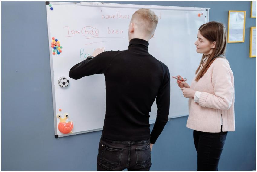 A student and teacher engage in an English lesson