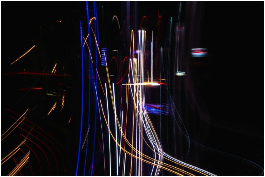 Abstract image of colorful light streaks forming p