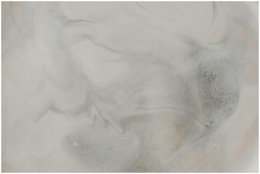 Close-up view of a smooth marble texture with gent