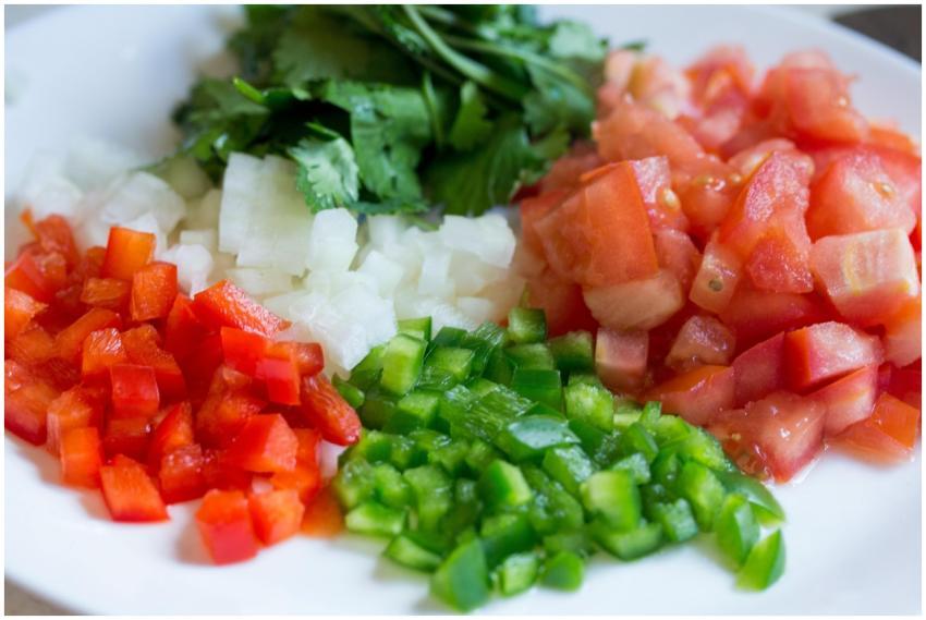 Colorful diced vegetables on a plate, perfect for