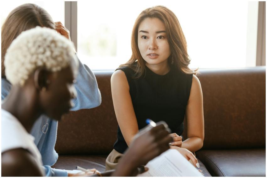 Young multiracial concentrated business partners t