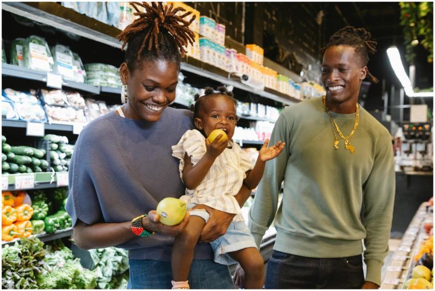 Happy family shopping together in a bright and liv