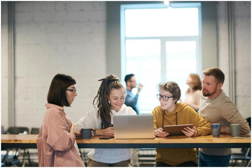 A group of young professionals collaborating indoo