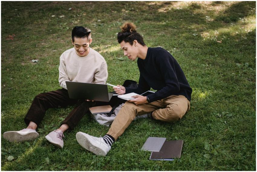 High angle full body of diverse classmates using l