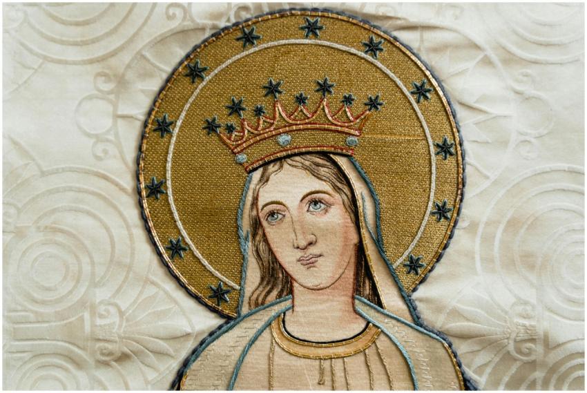 Beautifully detailed religious embroidery depictin