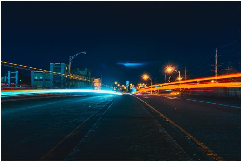 Captivating night cityscape with vibrant light tra