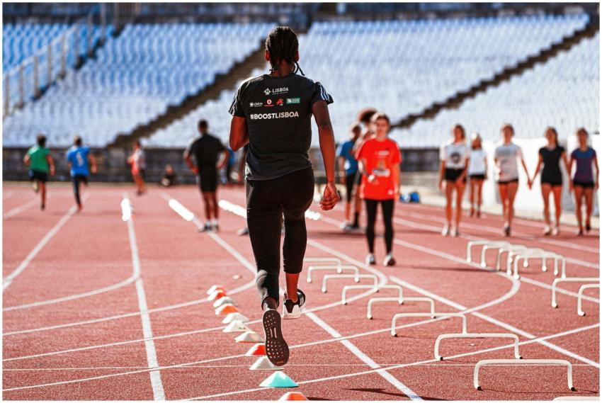An athlete performing drills on an outdoor track i