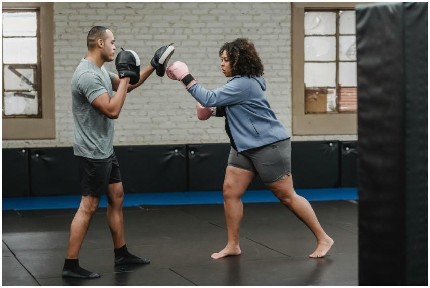 Side view of concentrated overweight African Ameri